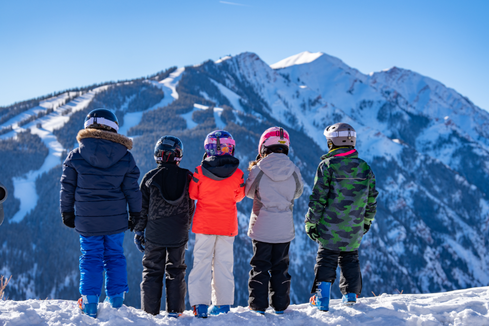 Kids standing on Buttermilk Mountain.